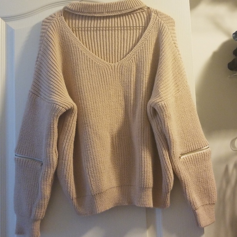 Pink sweater with neck detail